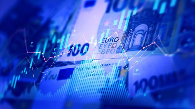 Euro banknotes with a market chart overlay